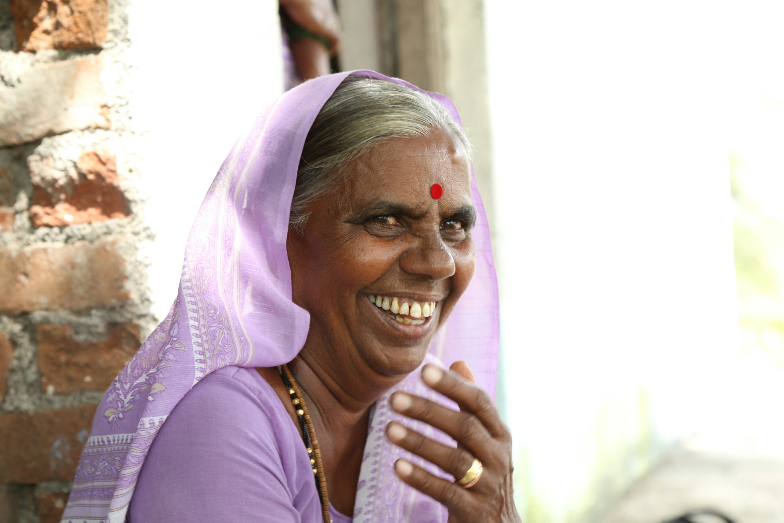 Happy woman smiling after successfully filing taxes