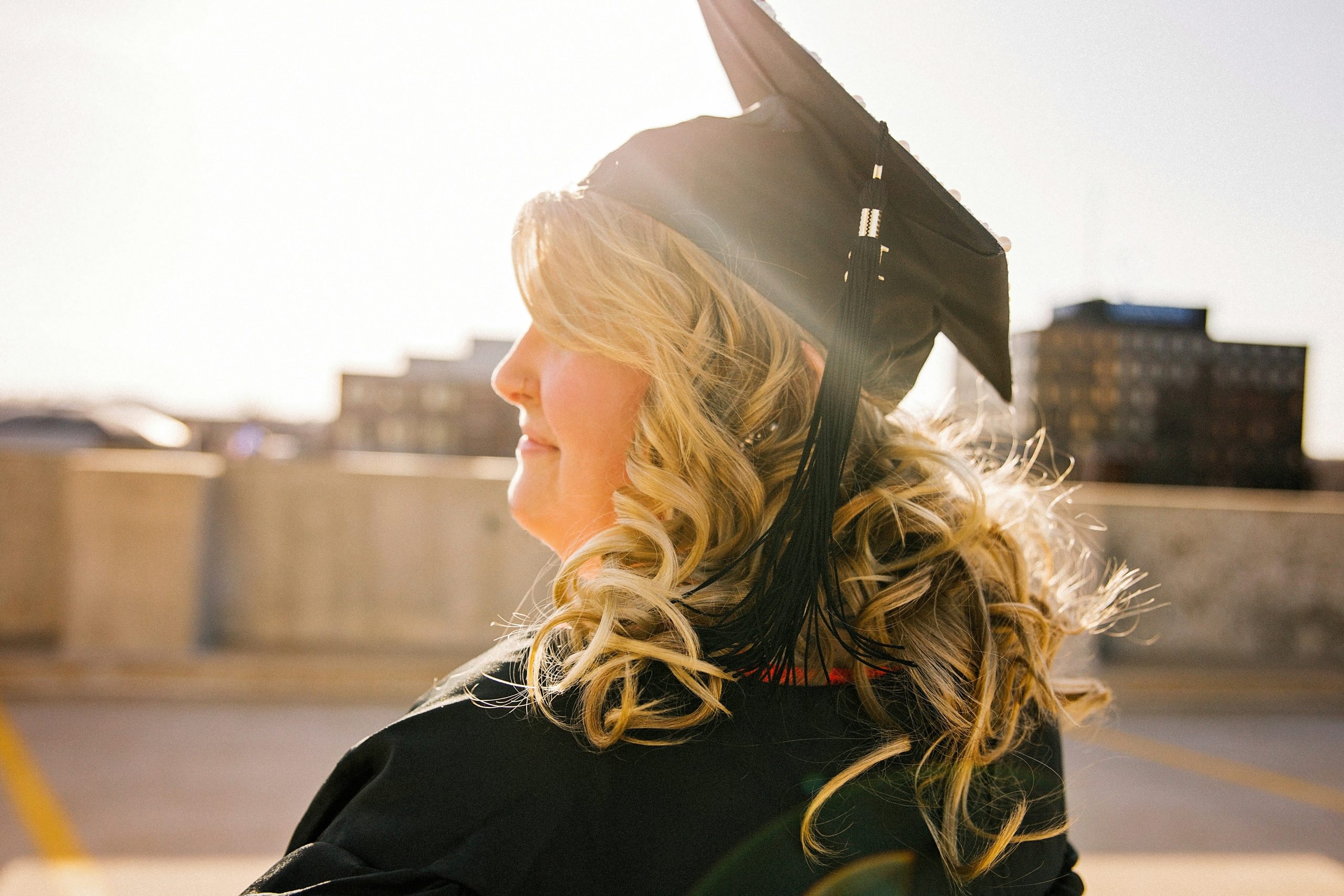 Illustration showing a diploma next to magnifying glass symbolizing due diligence in choosing certified programs.