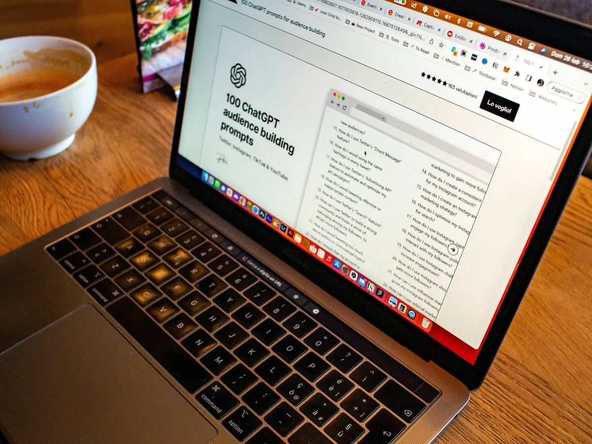 Clean workspace with laptop open and books neatly arranged.